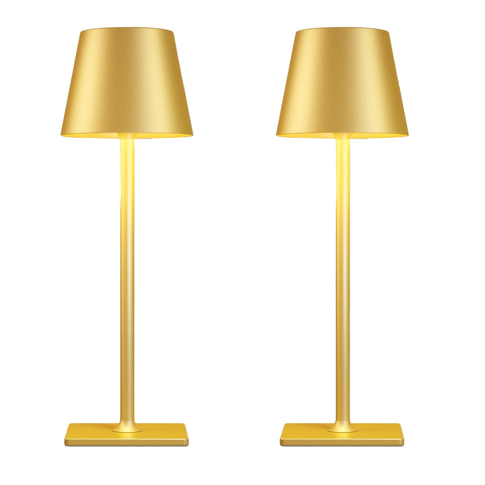 Yogaret gold rechargeable table lamp turned on, providing warm dining ambiance.