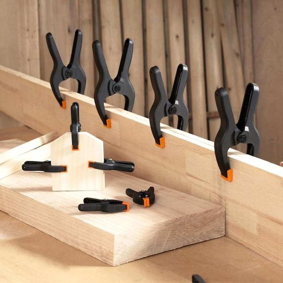 Youlina detachable orange pads demonstrate secure grip without marring surfaces.