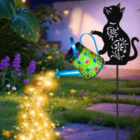 Yulloyello black-cat-solar-watering-can-lights illuminate garden at dusk with whimsical motif