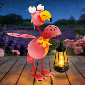 The Yulloyello flamingo-lantern-attachment creates charming nighttime ambiance along pathways.