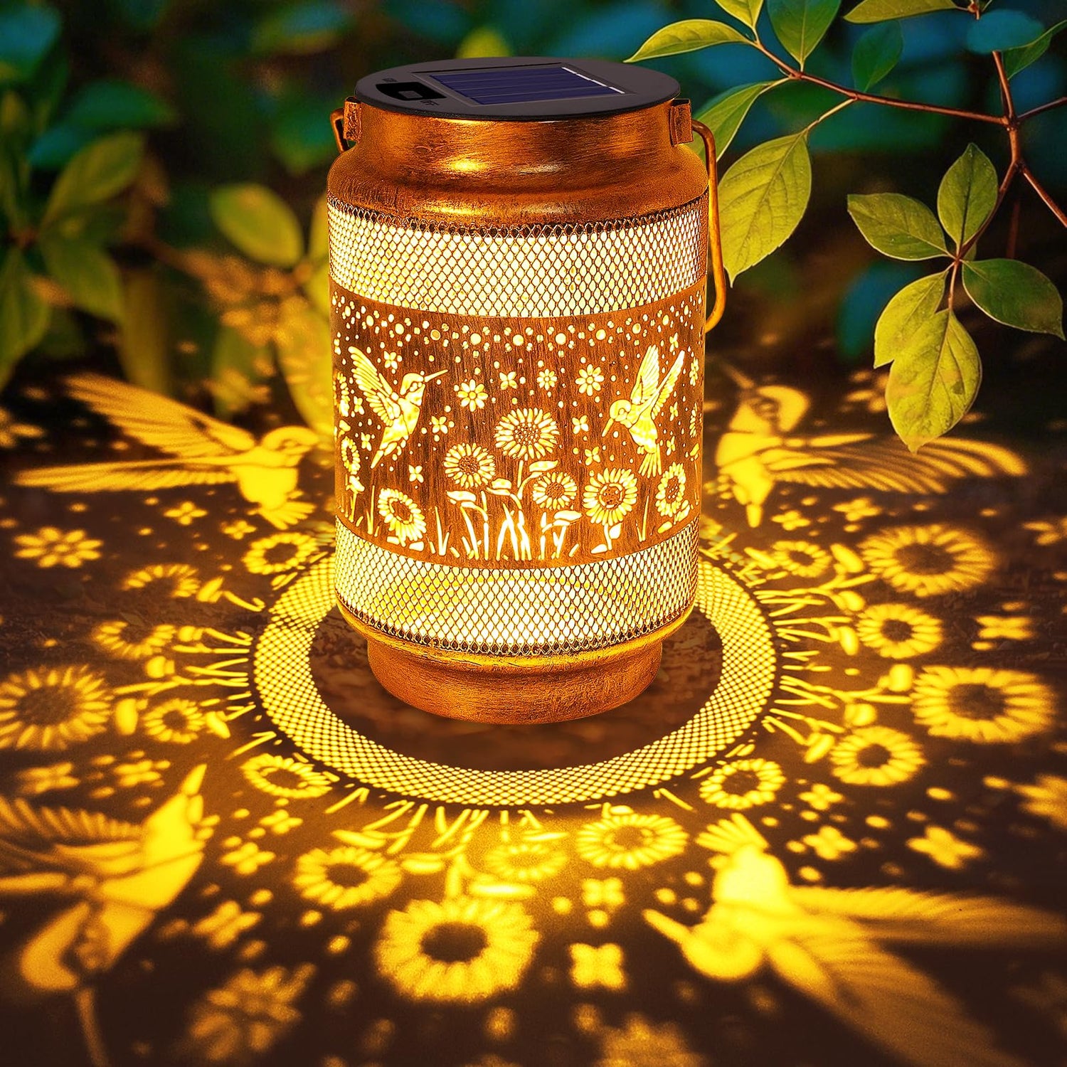 Yulloyello hummingbird solar lantern in gold bronze casts warm garden ambiance.