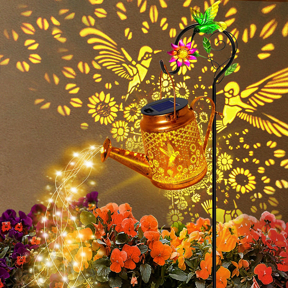 Yulloyello solar watering can lights with hanging hummingbird lantern for garden charm.