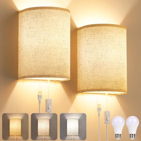 Yunaking plug-in wall sconce with linen shade for warm, inviting glow.