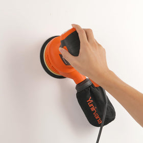 Ergonomic rubber grip on Yunirvana sander for secure control