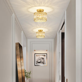 YURNYQ gold crystal-frame fixture adds elegant sparkle to rooms.