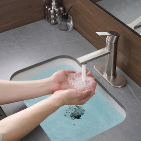 YXOCVIR 6-4-inch base install demonstrates versatile mounting for single or three-hole sinks.
