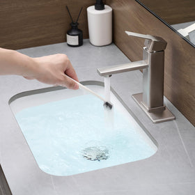 YXOCVIR brushed nickel faucet with adaptable three-hole panel mounting.