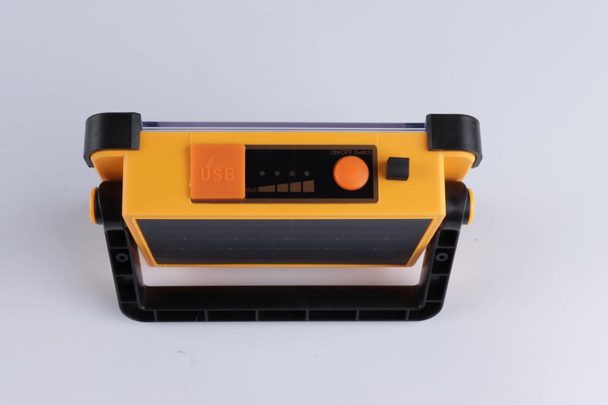 YXQUA 120W solar work light for car repairs enhances visibility in tight spaces.