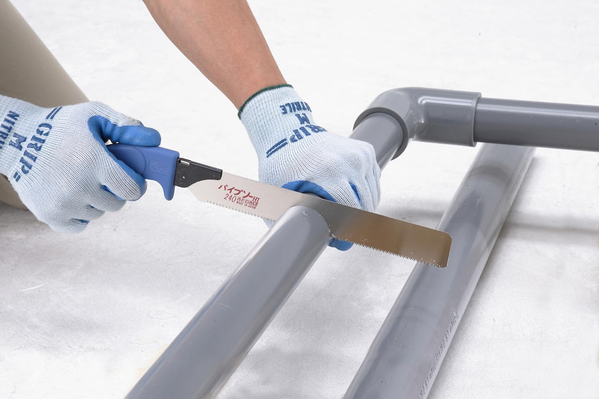 Z-saw Pipe Saw 240mm in action cutting PVC and wood.