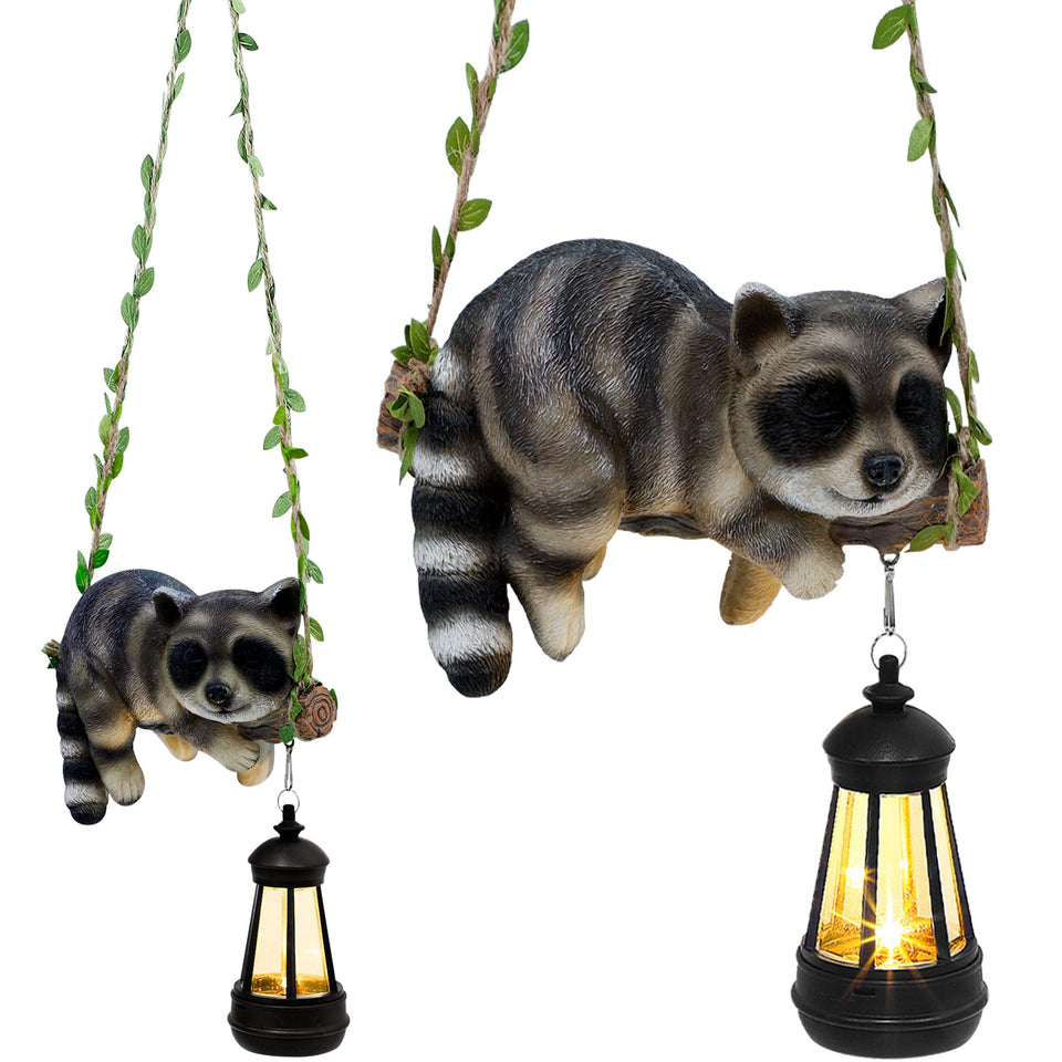 ZaaYee solar raccoon on a swing with lantern in garden, cozy decor