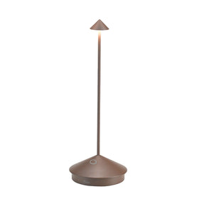 Zafferano Pina Pro lamp with rust color diffuser delivering warm ambience indoors