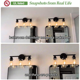 Zarbitta clear glass shades showcasing crisp, reflective light around the mirror.