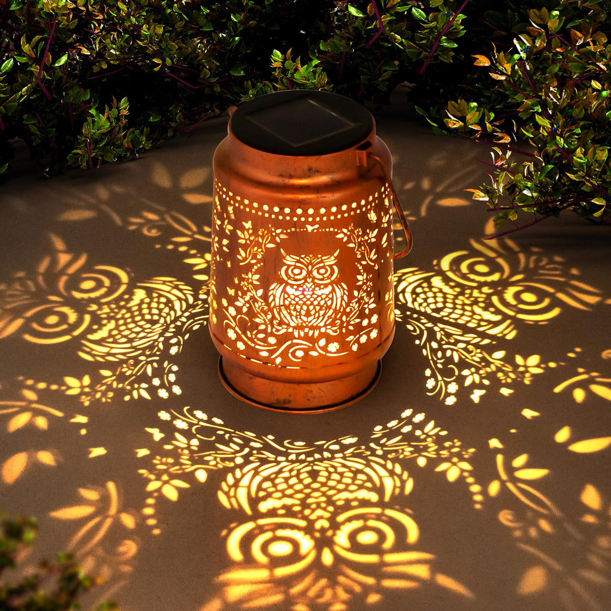 ZASOWUUO owl lantern with bronze finish glows softly for evening garden ambience.