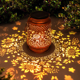 ZASOWUUO sunflower solar lantern glowing softly to brighten garden evenings.