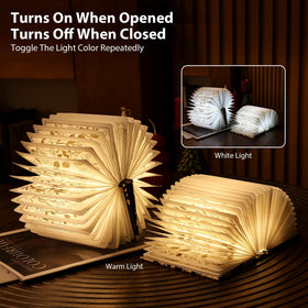 ZBOLE Floral Book Light on a desk provides glare-free reading illumination.