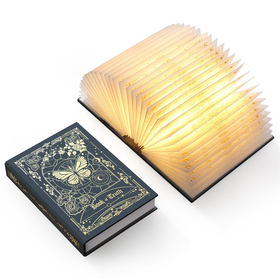 ZBOLE Magic Truth Book Light with golden cover enhances elegant decor and reading ambiance.