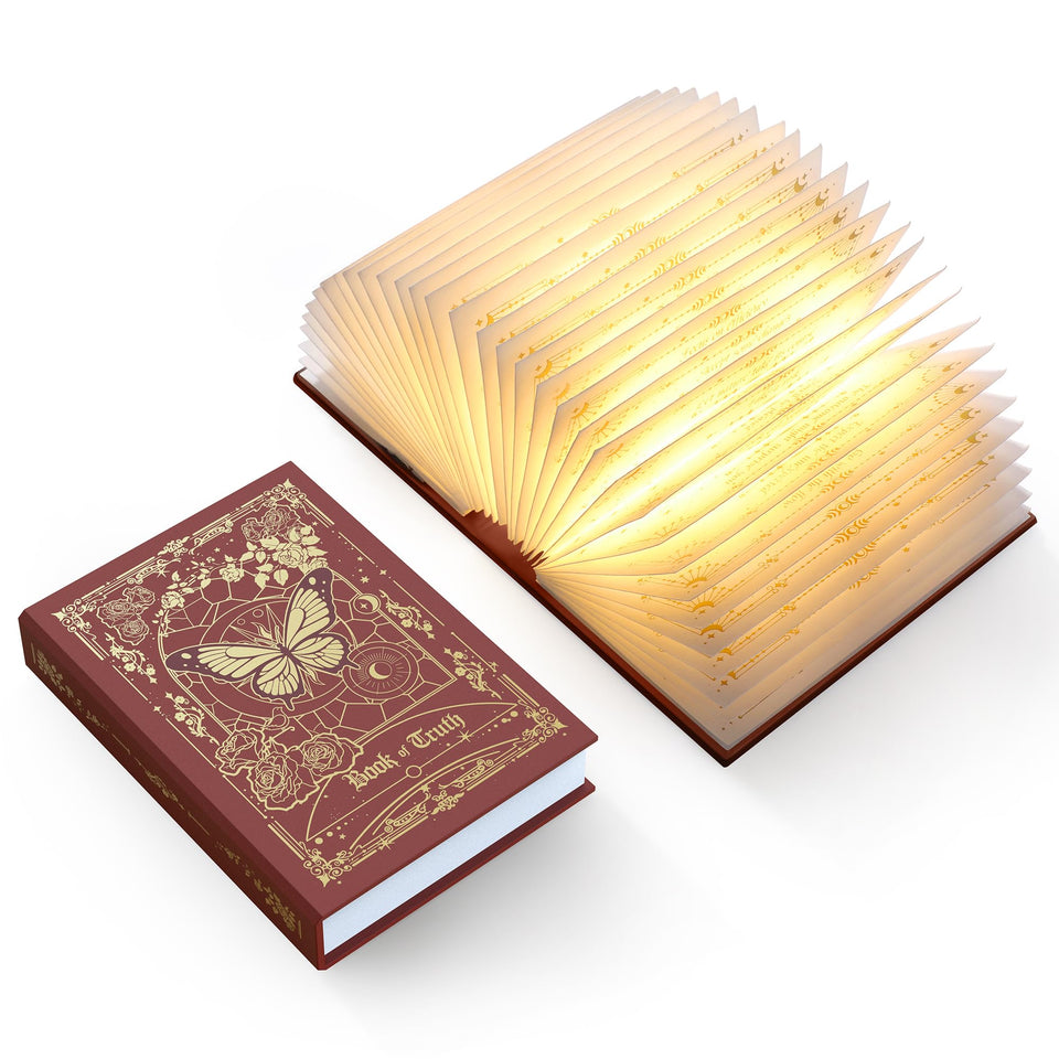 ZBOLE Magic Truth Book Light with gold cover adds elegant decor to any shelf.