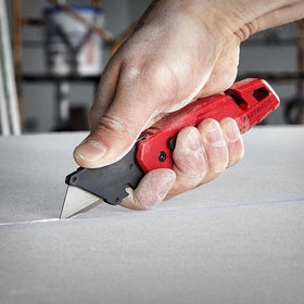 ZGHQHCDRH blade-storage-compartment-open highlights easy blade access when replacing blades.
