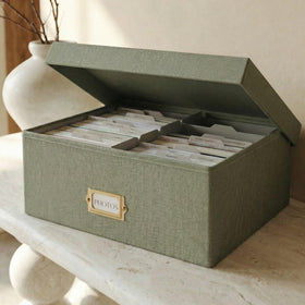 ZICOTO decorative photo box with lid showing eight compartments for 4x6 photos.