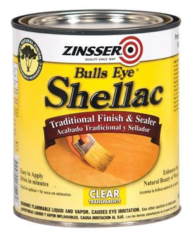 Zinsser Clear Shellac 1-Qt bottle sealing wood with a warm, transparent finish.