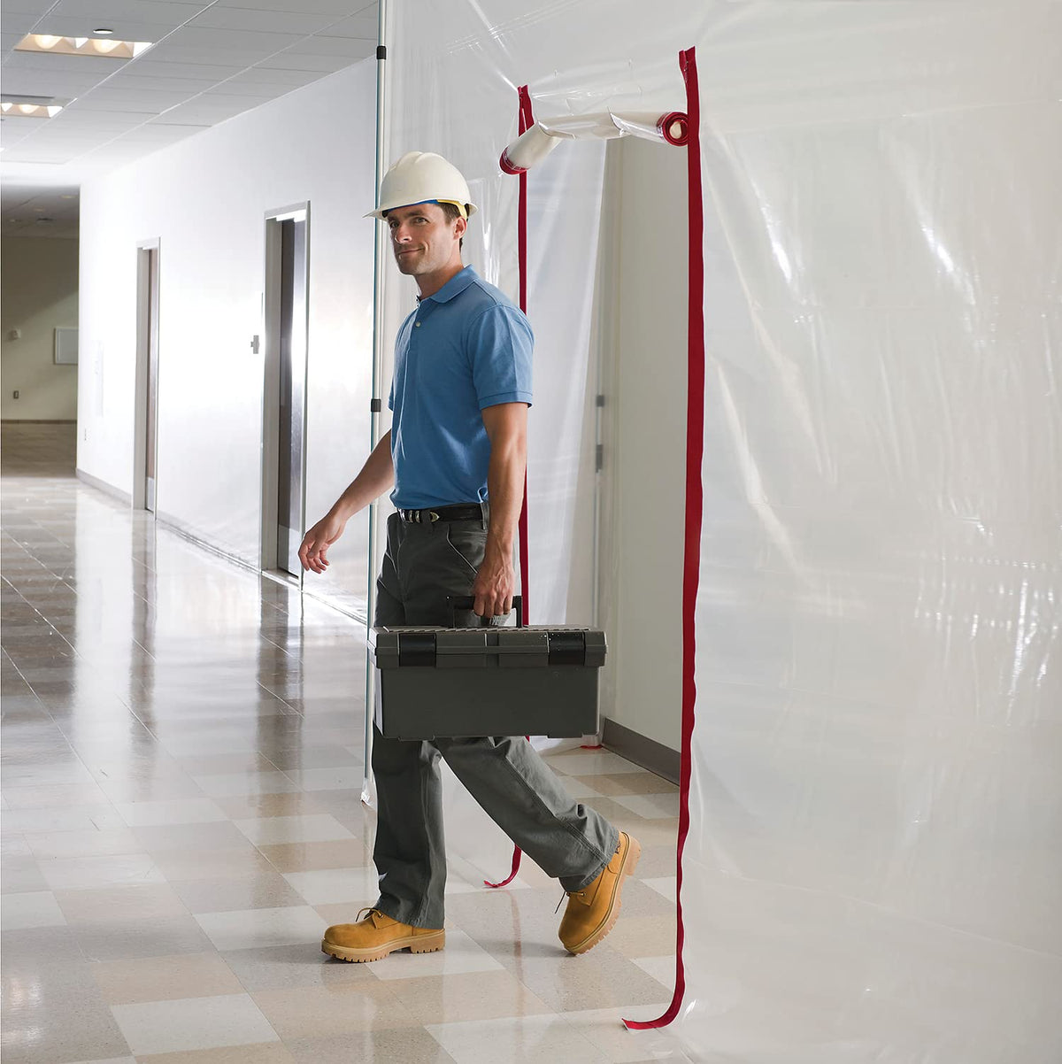 ZipWall barrier doorway showing dust containment during renovation.