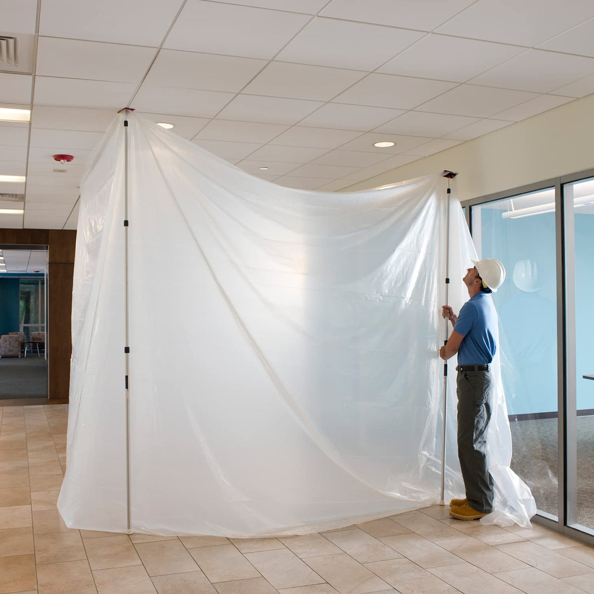 ZipWall ZP4 barrier in progress illustrating tool-free installation.