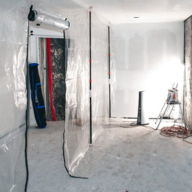 ZipWall ZP4 zipper doorway demonstrates easy access while maintaining dust seal.