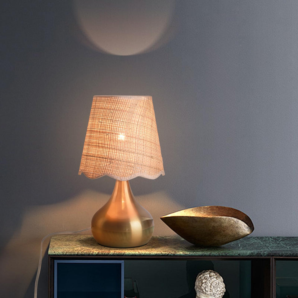 Ziqqeelam gold small bedside lamp with brass base for a chic nightstand.