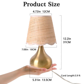 Ziqqeelam table lamp with beige linen shade for soft illumination.