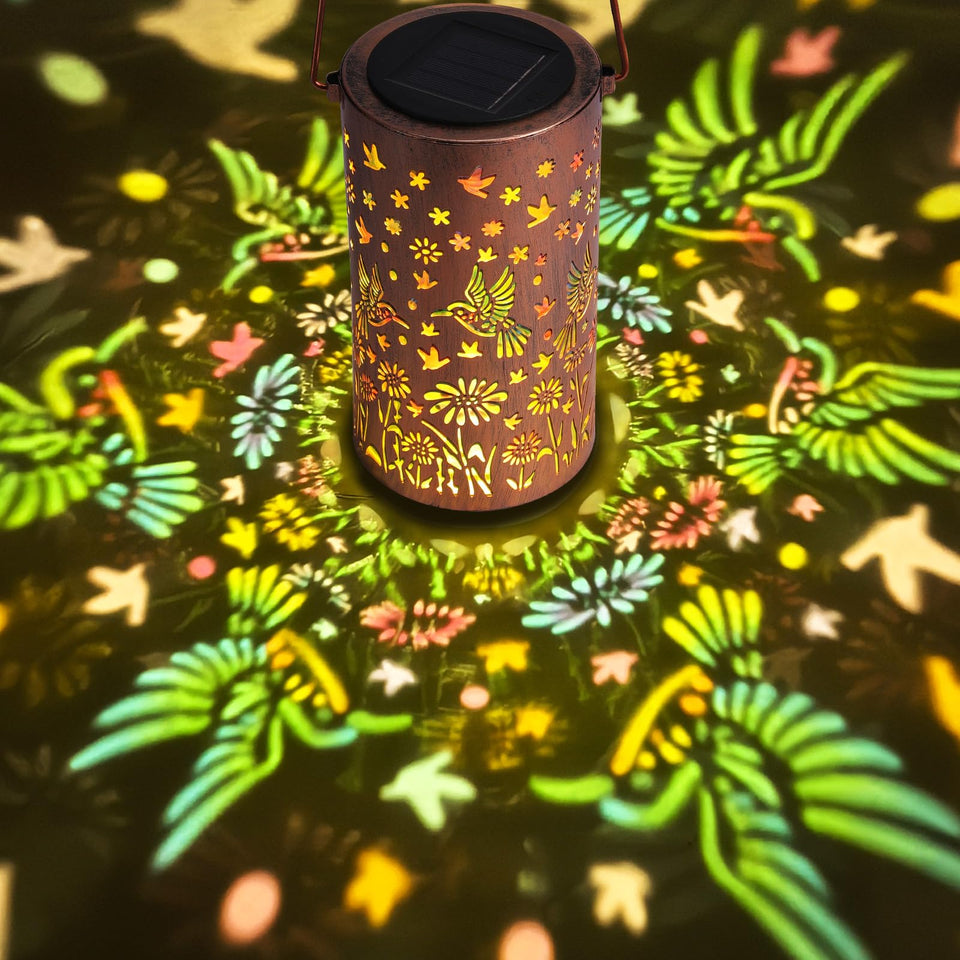 ZKLiLi colorful solar lantern with hummingbird motif adds warm garden ambiance.