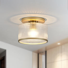 Zlepmlla ceiling light features a gold frame for modern elegance.