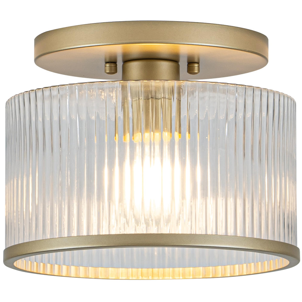 Zlepmlla glass ceiling light with ribbed shade diffuses warm glow.