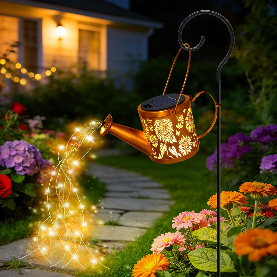 ZNYCYE solar watering can lights create a warm outdoor glow.