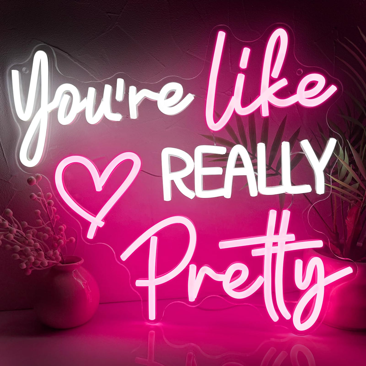 Zoaept You're Like Really Pretty neon sign with pink glow enhances bedroom ambiance.