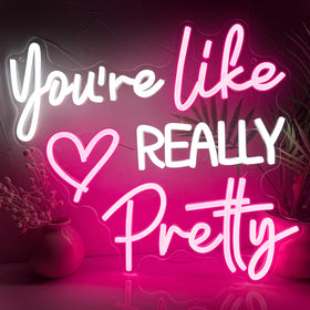 Zoaept You're Like Really Pretty neon sign with pink glow enhances bedroom ambiance.