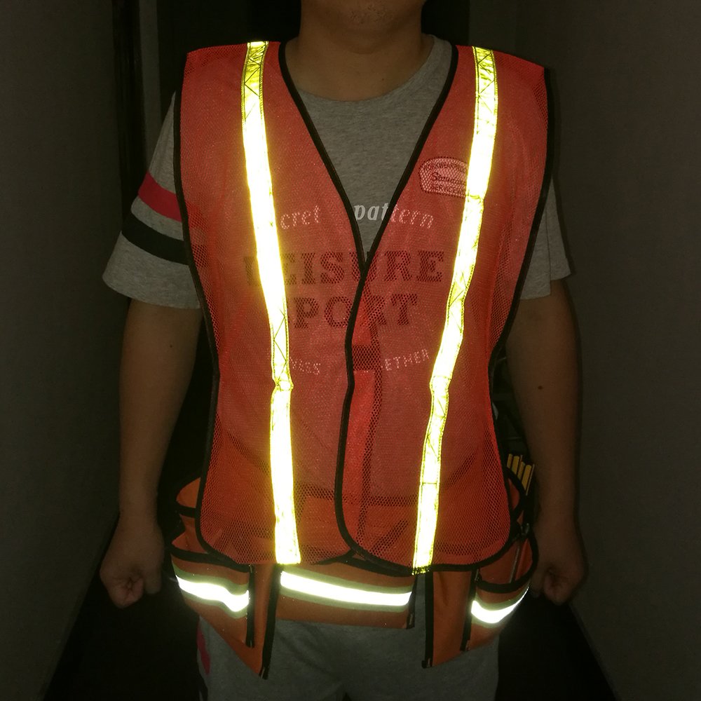 Model wearing Zojo reflective vest during outdoor activity for visibility