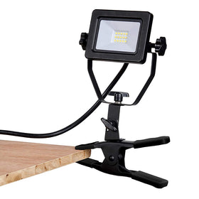 ZONE INDUSTRY CORP 1200-lumen LED clamp light illuminating a busy worksite