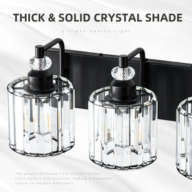 Zqoyn modern wall sconce with crystal reflections and black finish.