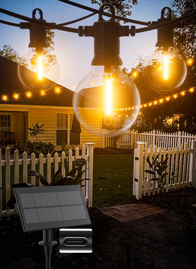Zuske solar string lights 100ft outdoor frame enhances patio with warm ambiance.