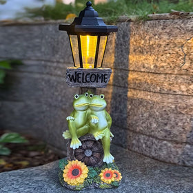 ZYLiWoo Solar Frog Garden Statue glows at dusk for welcoming outdoor ambience.